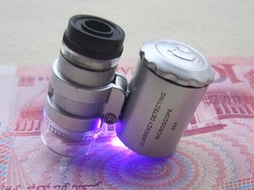 NO.9882 60X زوم الفضة LED الكشف عن العملة المجهر العدسة المجهرية المزود